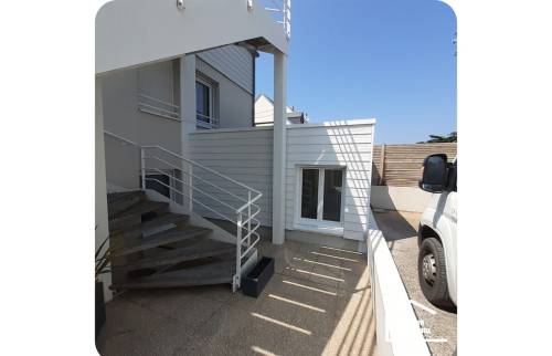 Création d'une extension d'un appartement au rez-de-chaussée