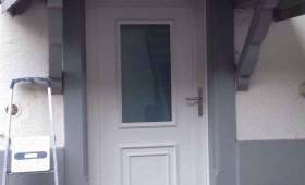 Porte d'entrée arrière PVC blanc à Village Neuf