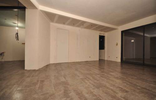 pose du carrelage neuf sur l'ancien