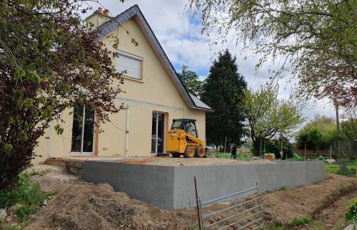 Travaux en cours - Dépose de l’ancienne véranda et coulage de dalle terrasse