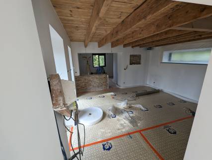 pose d'un sol chauffant dans une maison