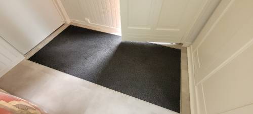 Détail tapis d'entrée