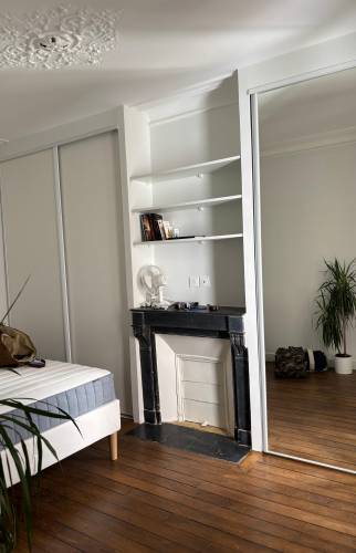 Chambre rénovée à Paris 17,  peinture et confort optimisé
