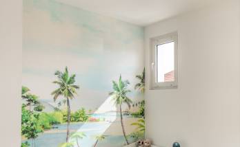 Chambre tropicale pour enfant à Le Pecq : Un coin de paradis à la maison.
