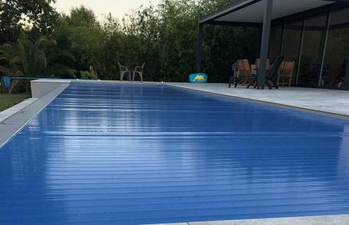 Sécurisation de piscine store à lames