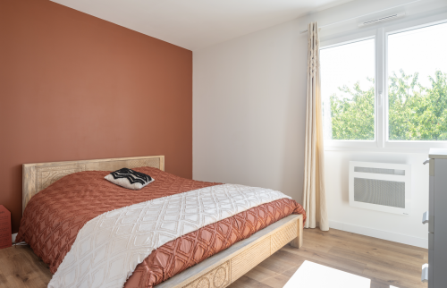 Surélévation d'une maison en ossature bois de 30 m² aux Sorinières - chambre