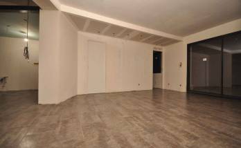 pose du carrelage neuf sur l'ancien