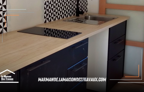 Parquet changé et création d'une cuisine pour la location.