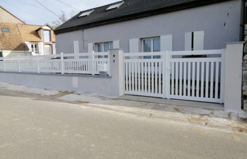 Portail et clôture à Esmans