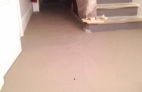 Pose d'un béton ciré pour recouvrir les pierres - 75016