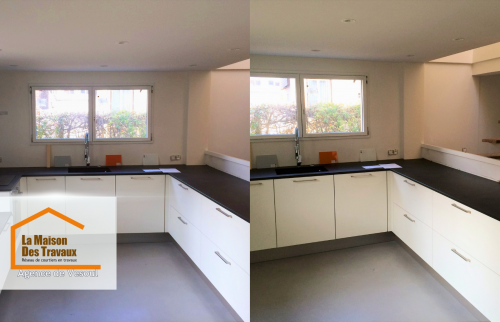 Cette cuisine en U combine élégance et fonctionnalité. Avec ses façades blanches et son plan de travail noir, elle optimise l’espace tout en offrant une circulation fluide. 