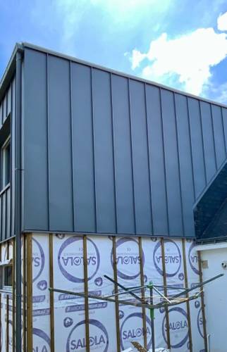 Bardage zinc sur extension d'habitation (56000)