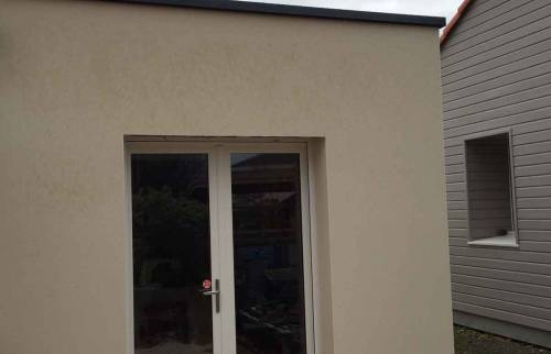 Réalisation d'une extension en toit plat à Vertou (44)