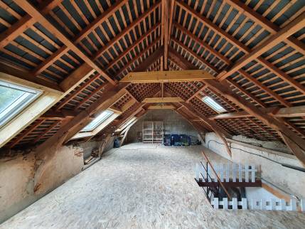 Rehausse des fermes pour une circulation aisée dans les combles