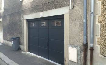 Pose d'une porte de garage avec portillon à Caen