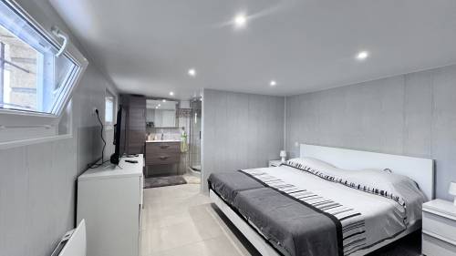 Garage transformé en chambre à coucher