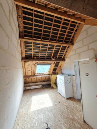 Vue de l’espace sous toiture avant l’aménagement de combles au-dessus du garage