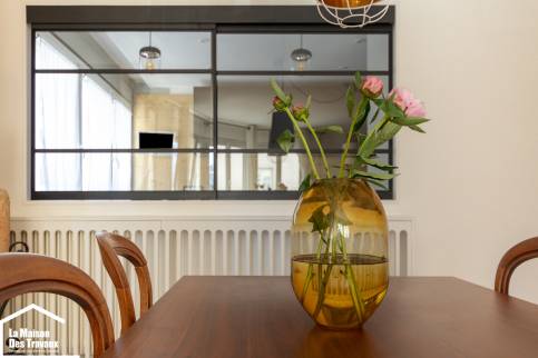 Rénovation et décoration d'un appartement de caractère situé sur Lyon : zoom sur la verrière avec panneaux coulissants