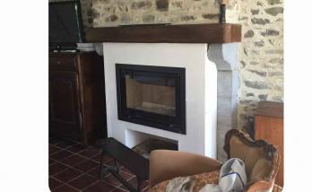 Insert posé dans une ancienne cheminée à Hauteville-Sur-Mer (50590).