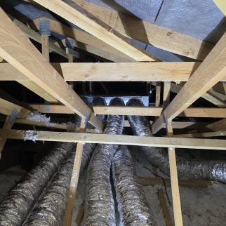 Installation de climatisation gainable avec passage de gaines dans les combles perdus - Ambérieu-en-Bugey 01500