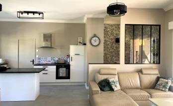 Neuville (69250) : rénovation intérieure avec création d'un sas d'entrée et nouvelle décoration du séjour et de la cuisine