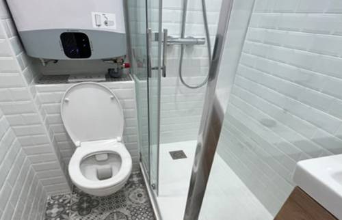 Salle de bain rénovée détail douche