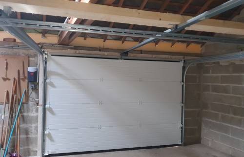 Remplacement de la porte de garage par une porte électrique moderne