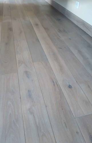 Pose de parquet massif gris de Guérande à Guebwiller