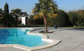 Terrasse piscine en béton matricé Les Gonds près de Saintes
