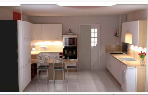 Cuisine ouverte dans un appartement T1 à La Baule