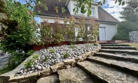 Rénovation extérieure à Sainte-Savine : une terrasse bois et un nouvel aménagement paysager 1