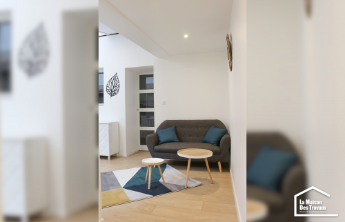 Véranda aménagée en salon