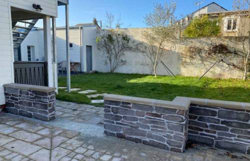 Rénover un mur extérieur à Trouville