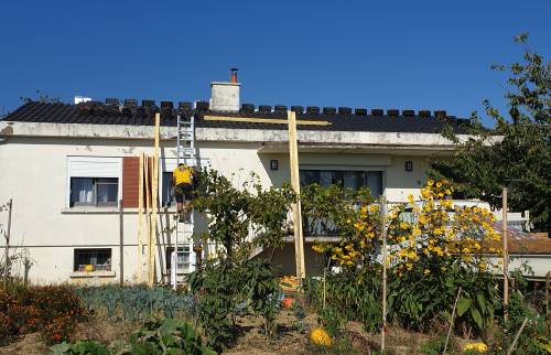 Pose des tuiles mécaniques noires