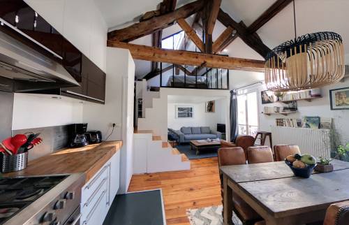 Le coin salon en fond du loft