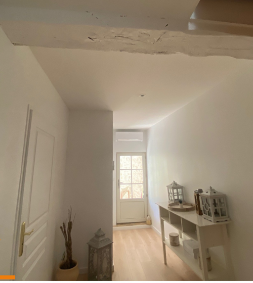 APRES Isolation d'un mur en pierre et finition peinture