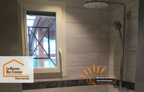 Barre de douche thermostatique avec pommeau pluie en inox pour un confort optimal et un style contemporain.