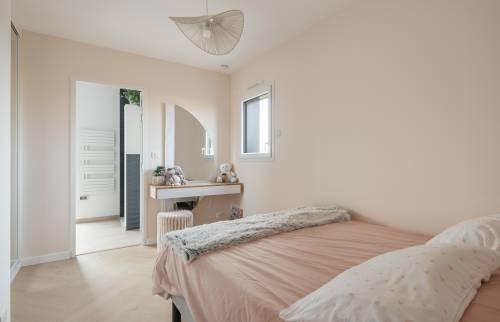 Surélévation à Vertou (44120) : un nouvel espace de vie en ossature bois - espace repos