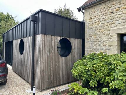 Eclairage hublot de l'extension de maison