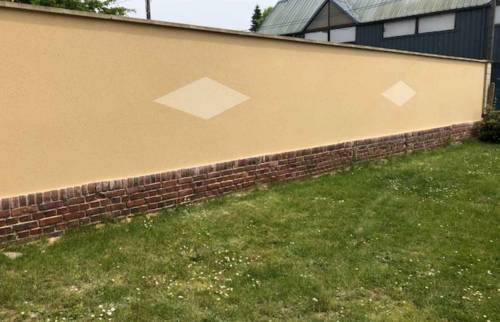 Rénovation du mur de la maison à Trouville