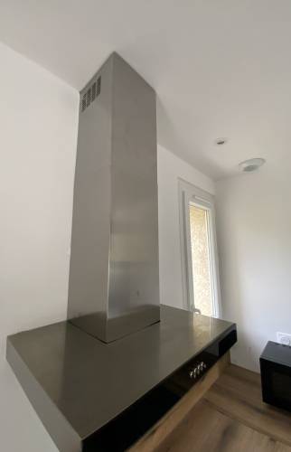 Focus hotte à évacuation extérieure équipement nouvelle cuisine Voulangis (77580)