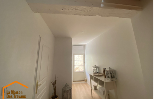 APRES Isolation d'un mur en pierre et finition peinture