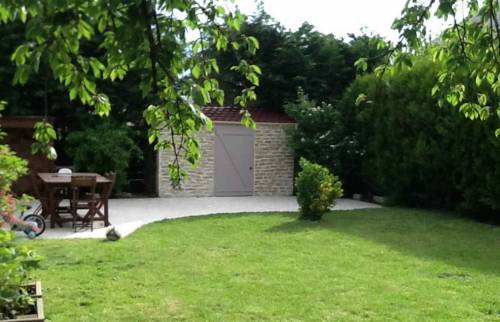 Terrasse et abri de jardin maçonné