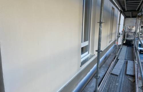 Enduit sur extension à ossature en bois