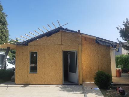 Travaux de construction d'une extension de maison avec pose de toiture - Meximieux 01800