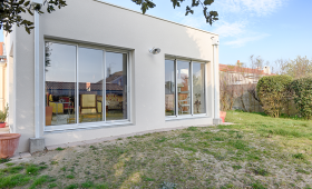 Extension latérale à toit plat dans l'agglomération de Pessac