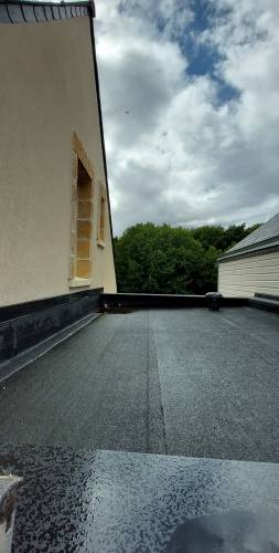 Isolation et étanchéité du toit plat de l'extension