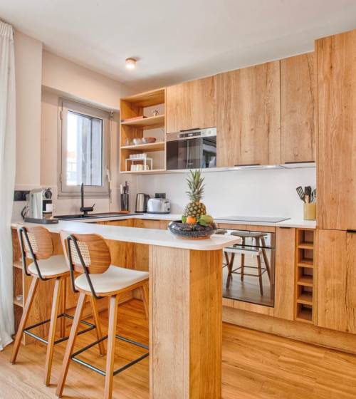 La cuisine ouverte sur le salon