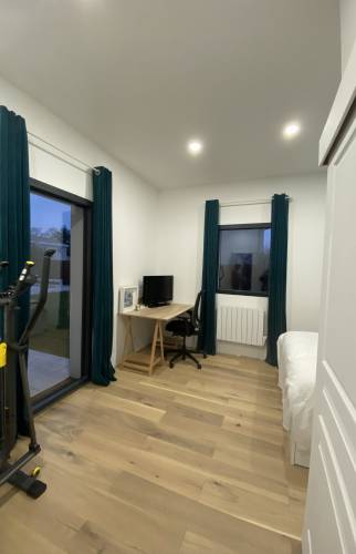 Extension pour accueillir un garage et une suite parentale au sein d'une maison bordelaise.