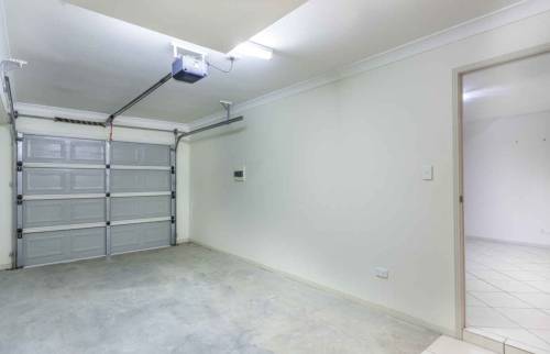 Isolation thermique par l'extérieur d'un garage à Granville (50400).